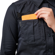 5.11 (62425) Close-up of zippered placket with melamine buttons and mic cord access at side seam. | The Fire Center