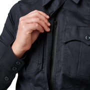 5.11 (62425) Close-up of zippered placket with melamine buttons and mic cord access at side seam. | The Fire Center
