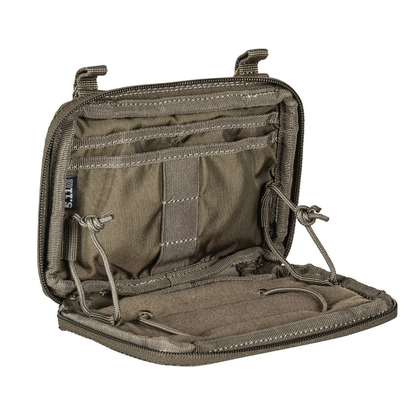 5.11 Tactical Flex Admin Pouch (56429) | The Fire Center | The Fire Store | Store | The smart features of the Flex Admin Pouch let you keep the tools of your trade organized and secure. Plus, it attaches to all platforms via Flex-HT™ Mounting System’s ½” webbing ladder and ¾” TPU coated straps. DIMENSIONS 4.5"H x 6.25"W x 1.0"D