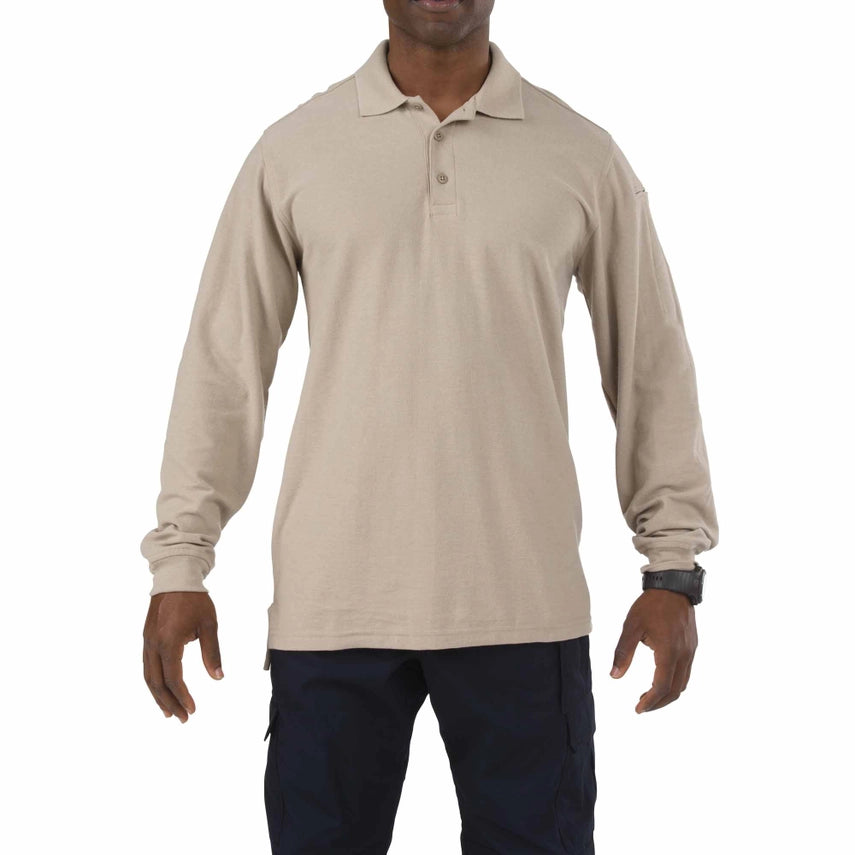 5.11 Tactical Utility Long Sleeve Polo (72057) | The Fire Center | The Fire Store | Store | Engineered for superior wearability and versatility across a wide spectrum of job environments, the Long Sleeve Utility Polo provides the same crisp, clean appearance as our traditional Professional Polo, while integrated side vents provide greatly increased air flow to keep you cool and collected