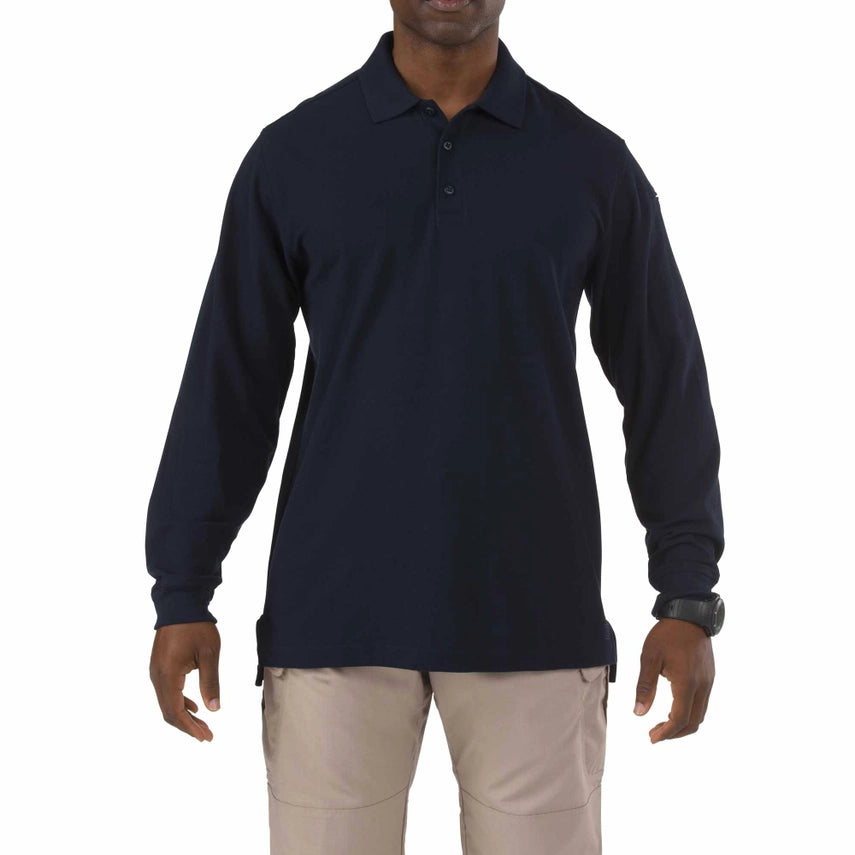 5.11 Tactical Utility Long Sleeve Polo (72057) | The Fire Center | The Fire Store | Store | Engineered for superior wearability and versatility across a wide spectrum of job environments, the Long Sleeve Utility Polo provides the same crisp, clean appearance as our traditional Professional Polo, while integrated side vents provide greatly increased air flow to keep you cool and collected