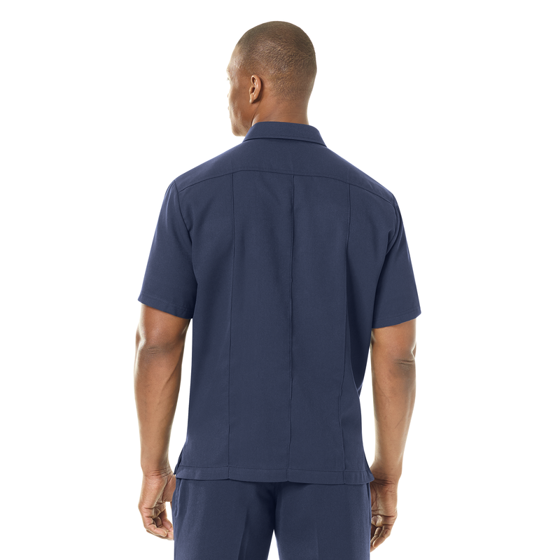 Introducing our new Station No. 73 Collection. Contemporary flame-resistant station wear built with functionality, comfort and NFPA® 1975 compliance in mind. Developed with extra features that enhance daily wear and fabric that more effectively wicks moisture from the skin to help reduce heat stress when things heat up. No badge tab. No epaulets. Straight bottom hem with side vents. Banded collar for professional appearance.