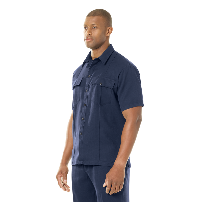 Introducing our new Station No. 73 Collection. Contemporary flame-resistant station wear built with functionality, comfort and NFPA® 1975 compliance in mind. Developed with extra features that enhance daily wear and fabric that more effectively wicks moisture from the skin to help reduce heat stress when things heat up. No badge tab. No epaulets. Straight bottom hem with side vents. Banded collar for professional appearance.