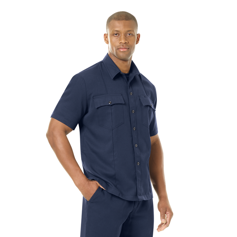 Introducing our new Station No. 73 Collection. Contemporary flame-resistant station wear built with functionality, comfort and NFPA® 1975 compliance in mind. Developed with extra features that enhance daily wear and fabric that more effectively wicks moisture from the skin to help reduce heat stress when things heat up. No badge tab. No epaulets. Straight bottom hem with side vents. Banded collar for professional appearance.