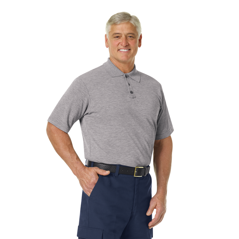 More protection. More benefits. More comfort. Our FR station wear classic short sleeve polo shirt made with Tecasafe® Plus Knit serves you better than cotton t-shirts with enhanced seam strength and fire service-specific features. Durable, comfortable, and cool. We've got you covered. Ribbed-knit collar. Hidden microphone pockets on both shoulders and pen pocket on left sleeve. Longer back hem helps stay tucked. Three button front placket with added mic loop.