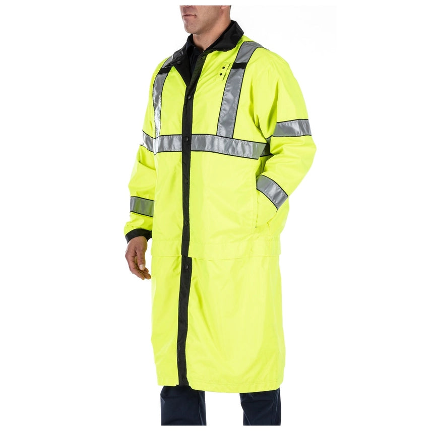 5.11 Tactical Reversible Hi-Vis Rain Coat (48125) | The Fire Center | The Fire Store | Store | FREE SHIPPING | REVERSIBLE HI-VIS RAIN COAT DETAILS Offering fully waterproof weather protection and ANSI/ISEA 107-2015 Type R & P, Class 3 visibility for night time or low light environments, the Long Reversible High Vis Rain Coat is a great value for patrol officers.