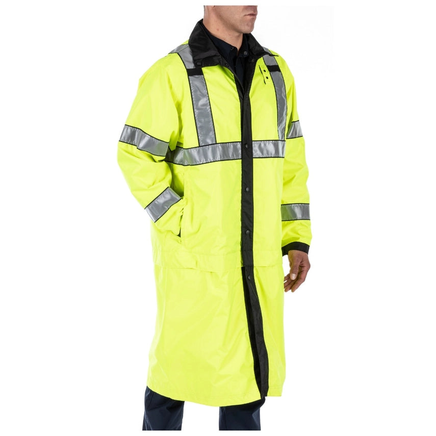 5.11 Tactical Reversible Hi-Vis Rain Coat (48125) | The Fire Center | The Fire Store | Store | REVERSIBLE HI-VIS RAIN COAT DETAILS Offering fully waterproof weather protection and ANSI/ISEA 107-2015 Type R & P, Class 3 visibility for night time or low light environments, the Long Reversible High Vis Rain Coat is a great value for patrol officers.