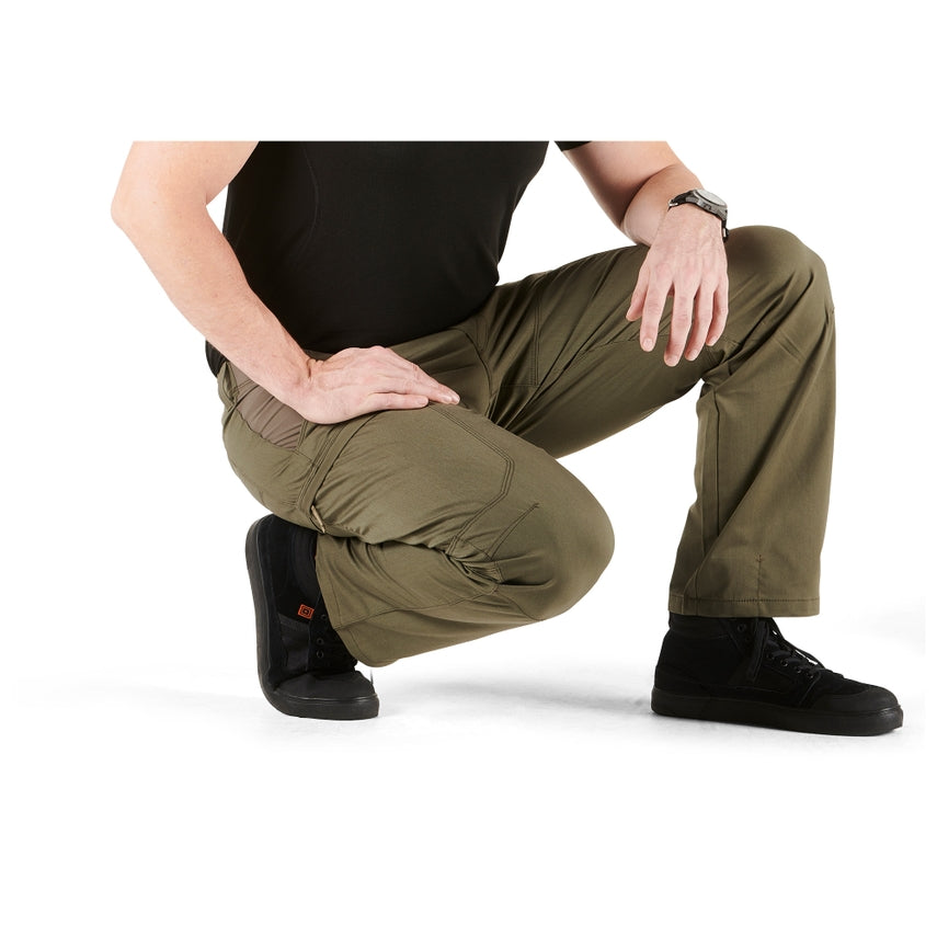 5.11 Tactical APEX™ Pant (74434) | The Fire Center | The Fire Store | Store | Fuego Fire Center | Firefighter Gear | Flexible and functional, the Apex Pant sets the standard for speed and versatility with 5.11®’s Flex-Tac® mechanical stretch canvas. Featuring a comfort waistband, an internal flex cuff pocket, hidden handcuff key pocket, zippered thigh pockets with internal magazine storage, and deep, reinforced main pockets, the Apex Pant is made for action. 