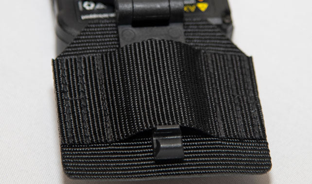 This sew-anywhere body camera mount is constructed of durable, heavy-duty nylon webbing with a double-stitched transverse mounting strap.  Built for the Axon Mini MOLLE mount - which is designed to mitigate the up/down/left/right movements that may occur in some deployments, and to keep the camera locked onto the garment to prevent accidental release.