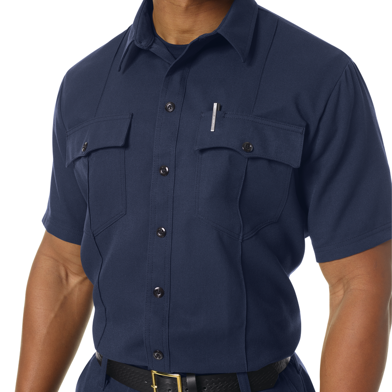 Introducing our new Station No. 73 Collection. Contemporary flame-resistant station wear built with functionality, comfort and NFPA® 1975 compliance in mind. Developed with extra features that enhance daily wear and fabric that more effectively wicks moisture from the skin to help reduce heat stress when things heat up. No badge tab. No epaulets. Straight bottom hem with side vents. Banded collar for professional appearance. 